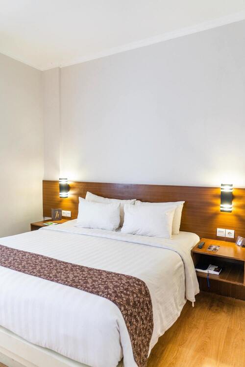 photo d'une chambre de l'Hôtel Tout bleu et blanc